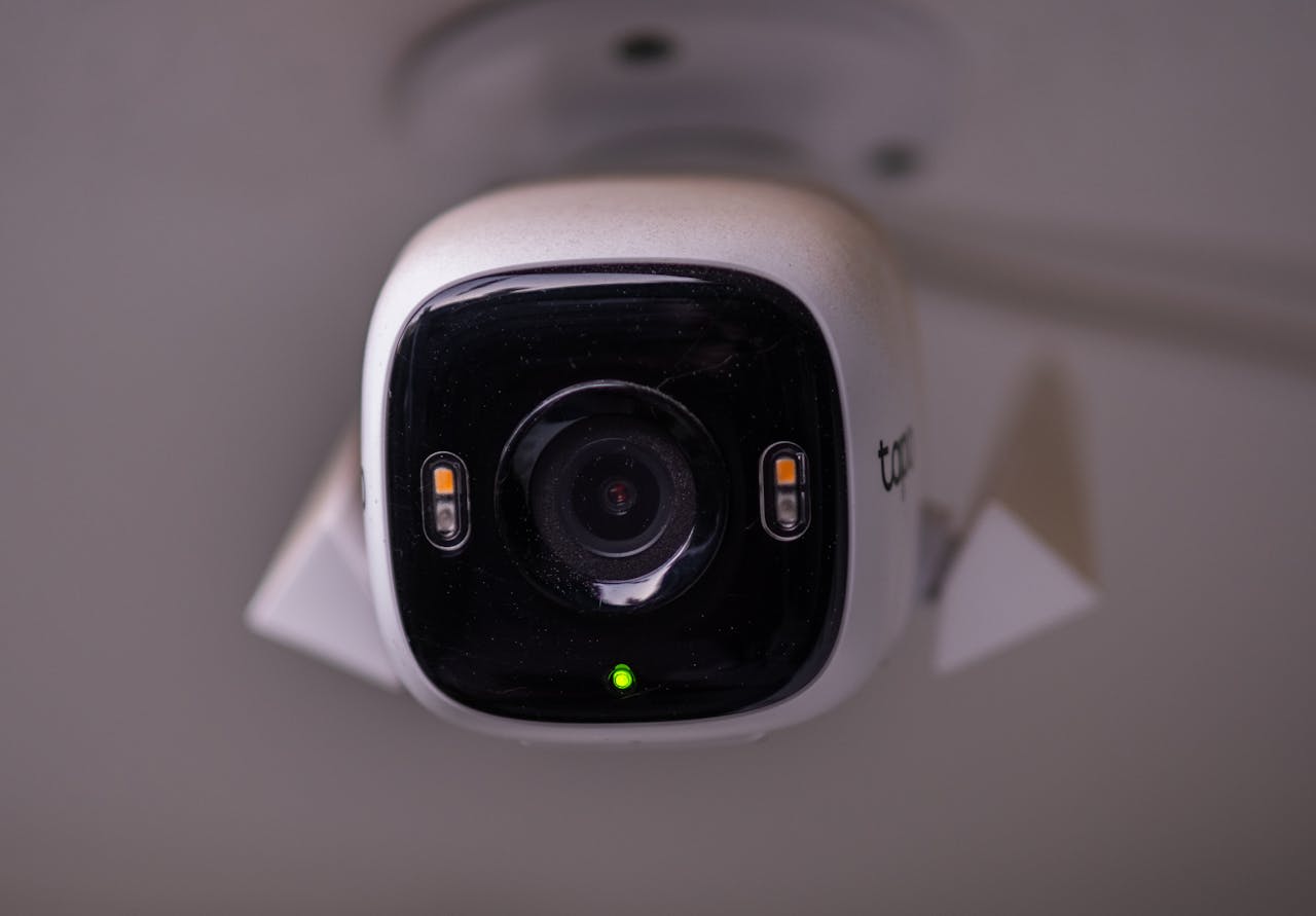 gallery-1 Detailed view of a modern security camera installed indoors in İzmir, Türkiye.
